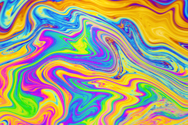 istock Psychedelic multicolored background abstract. Rainbow colors. patterns background. Photo macro shot of soap bubbles 2181808057