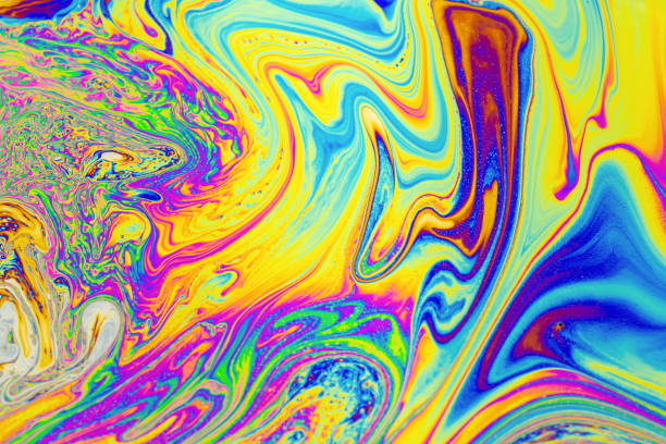 istock Psychedelic multicolored background abstract. Rainbow colors. patterns background. Photo macro shot of soap bubbles 2181808371