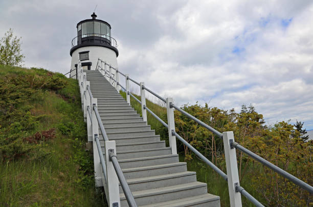 Historic 19th century Owls Head Light on Atlantic coast of Maine