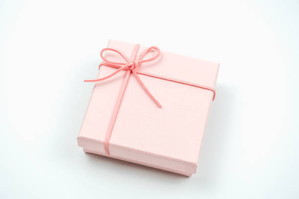 istock Charming pink gift box with a delicate ribbon, perfect for celebrations, birthdays, or special occasions. 2181812709