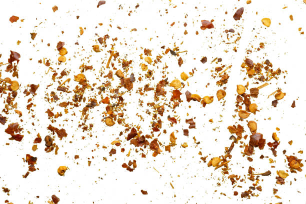 istock dried red chili pepper flakes and seeds isolated on white background 2181813954
