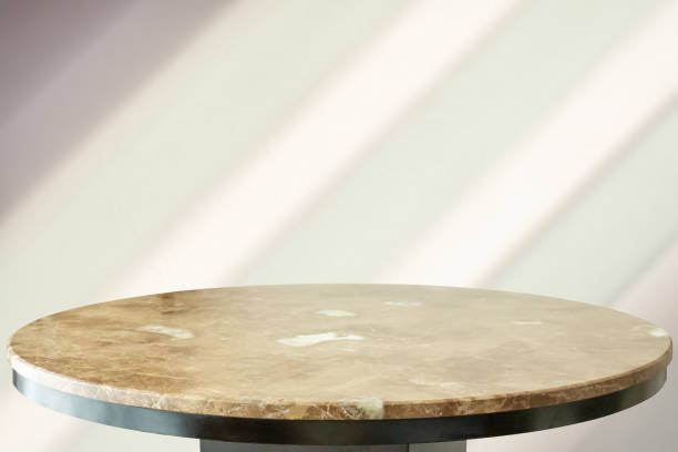istock Round marble table top with abstract shadow drop on white wall background for mockup product display 2181814153
