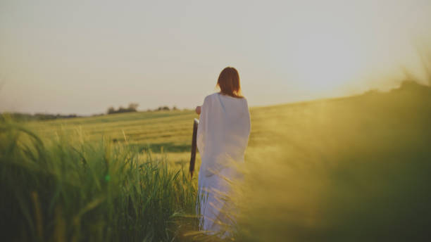 istock Serene Meditation in Golden Wheat Field 2181817712
