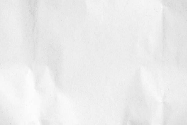 istock White recycled craft paper texture as background. Grey paper texture, Old vintage page or grunge vignette of old newspaper. Pattern rough art creased grunge letter. Hardboard with copy space for text. 2181817836