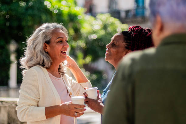 istock Seniors friends talking outdoors 2181821544