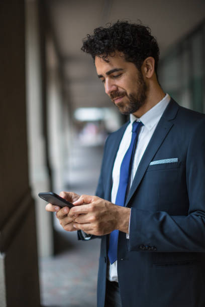 istock Businessman Checking Smartphone 2181828852