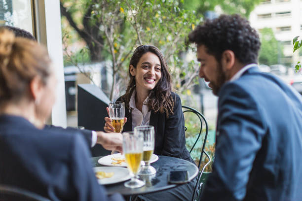 istock Business Team Enjoying Drinks at Outdoor Cafe 2181828906