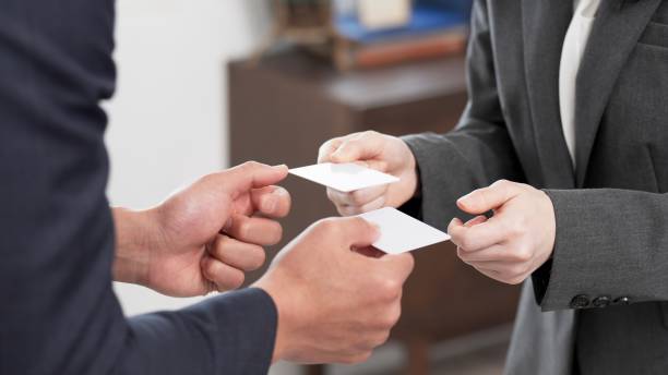 istock Business people exchanging business cards 2181833661