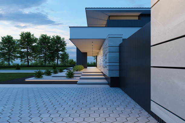 istock Contemporary Villa with Stunning Stone Facade and Front Yard at Sunset 2181833671