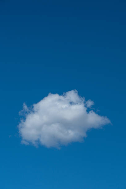 istock Single Cloud in the Sky - Color Portrait Format 2181840771