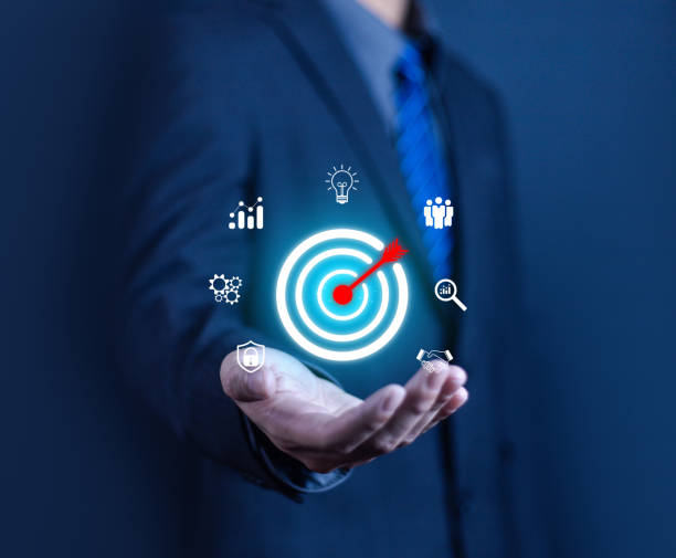 istock Business goal setting concept. Businessman holding virtual target icon for business purpose. Strategic planning for business growth. Marketing strategy and goal for success. 2181841981