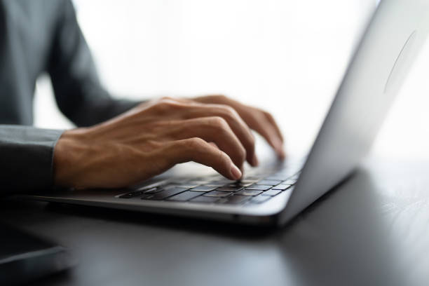 istock Business man working with laptop Hands typing  keyboard. Professional investor working new start up project. business planning in office. Technology business.. 2181844594