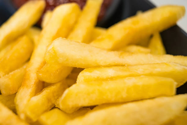 French Fries in basket on a table in a cafe
