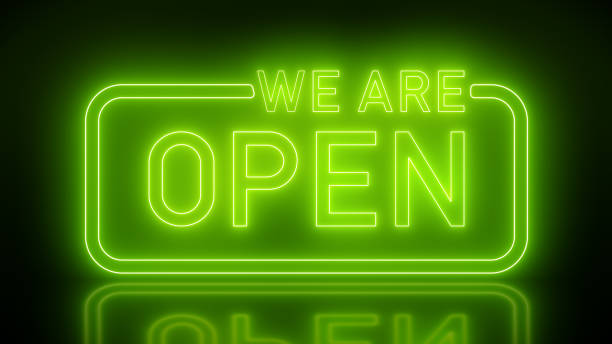 istock Illustation of glowing neon sign with message, we are open in green 2181848957