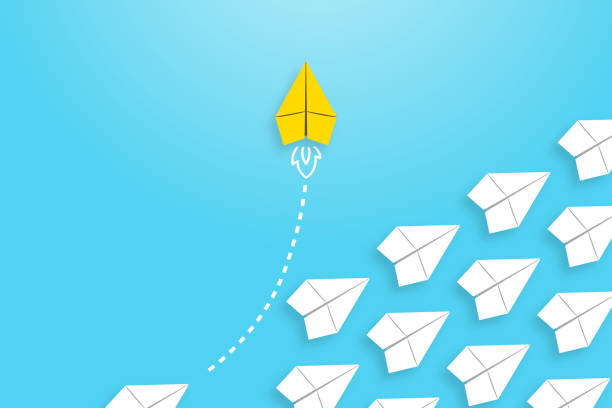 istock Change concepts with yellow paper airplane leading among white. 2181852330