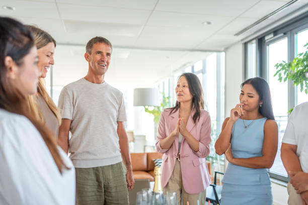 istock Diverse Team Celebrating with Champagne in Office 2181859784