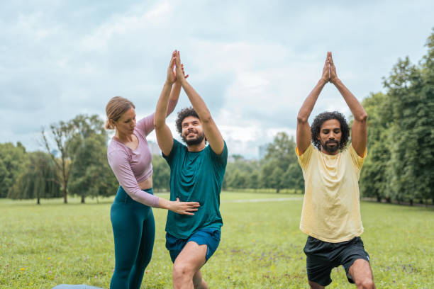 istock Diverse Yoga Class at Public Park 2181860093