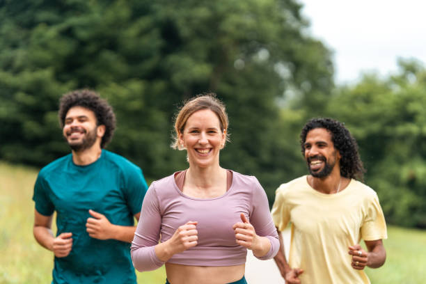 istock Diverse Trio Enjoying Park Run Together 2181860109