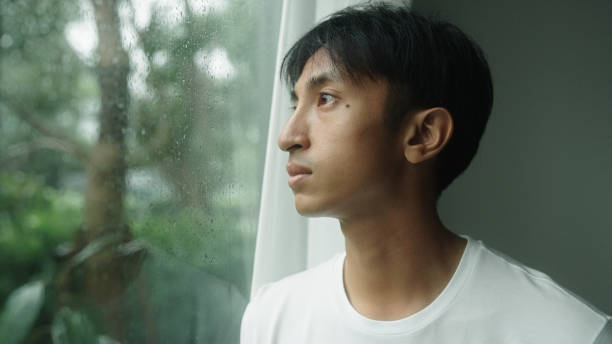 istock Man calmly at home with the rain. 2181862006