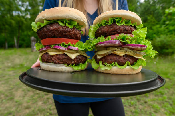 istock Serve huge hamburgers with double beef 2181865694