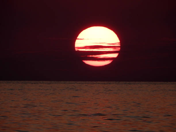 Sunset and dramatic cloudscape over the Mediterranean Sea.
