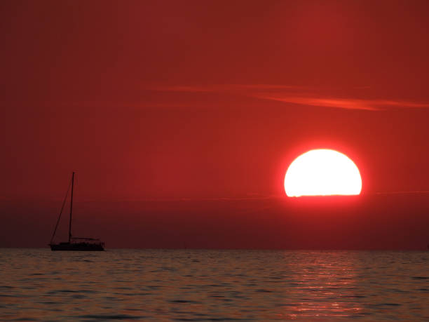 Sunset sailing off the city of Cape Town, South Africa