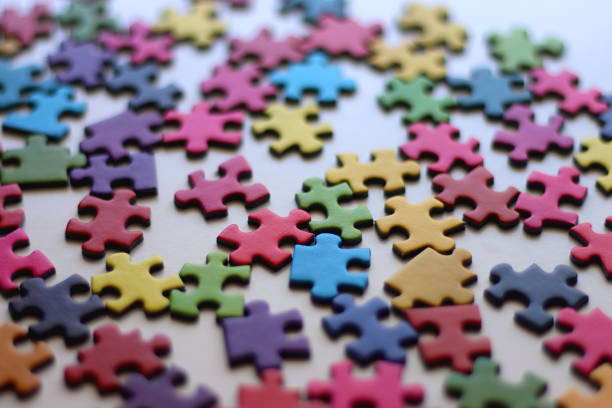 istock Colorful Jigsaw Puzzle Pieces 2181868412