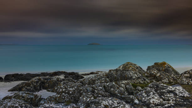 A long exposure shot of the coastline around the Hebridean island of Eriskay.