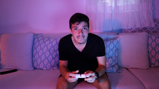 istock Young man distressed by losing at video game 2181885440