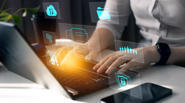 istock Business woman using a laptop with digital graph to document management. Software online documentation database and digital file storage system and file access concept.Enterprise resource planning. 2181886886