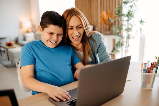 istock Mother and son working on laptop 2181888135