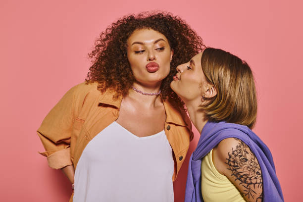 istock Joyful multicultural lesbian couple celebrating love in a vibrant studio setting 2181888212
