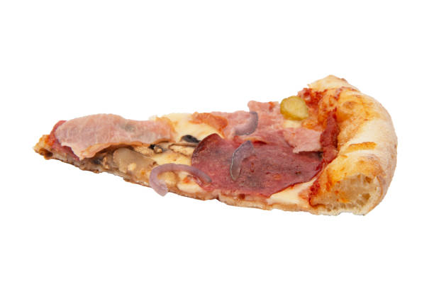 Quarter of salami pizza on a cutting board