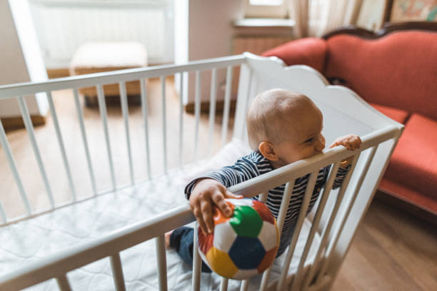 little kid in the crib