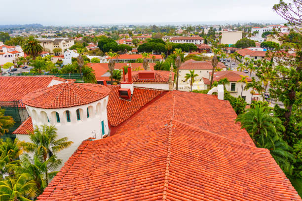 Santa Barbara, California - April 20, 2024: Stunning aerial view capturing red-tiled roofs and lush greenery around Santa Barbara County Courthouse.