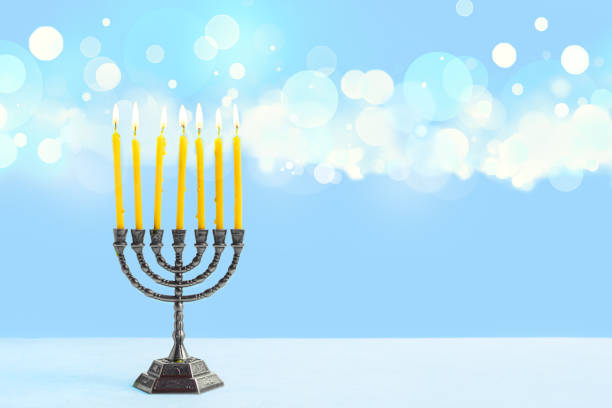 istock Hanukkah Menorah with burning candles 2181899860
