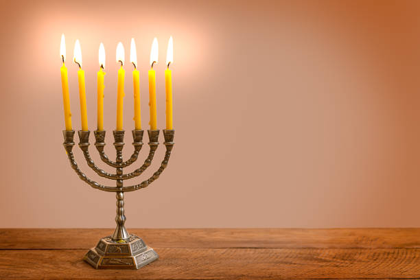 istock Hanukkah Menorah with burning candles 2181899909