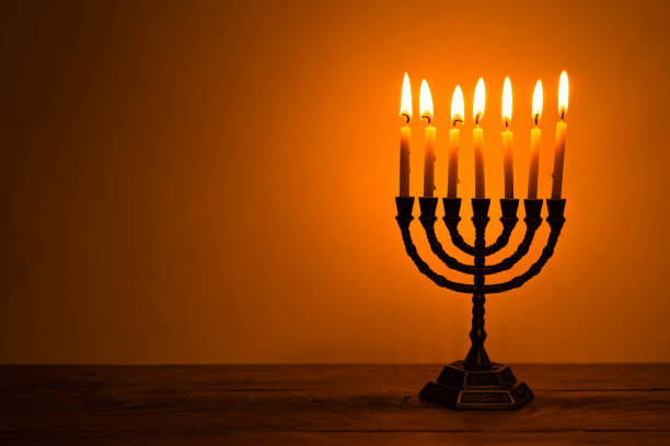 istock Hanukkah Menorah with burning candles 2181899968