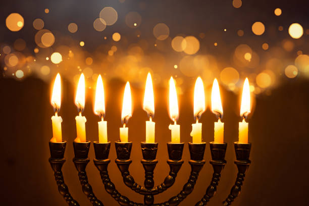 istock Hanukkah Menorah with burning candles 2181900018