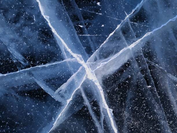 istock Blue cracked ice texture on lake Baikal. Natural pattern 2181900204