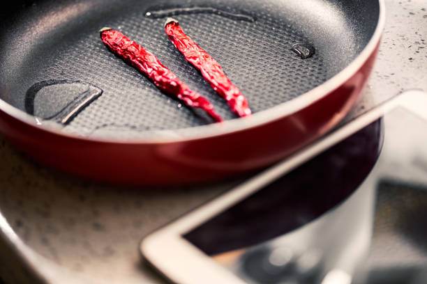 Red Chilli Peppers in a Frying Pan good photo