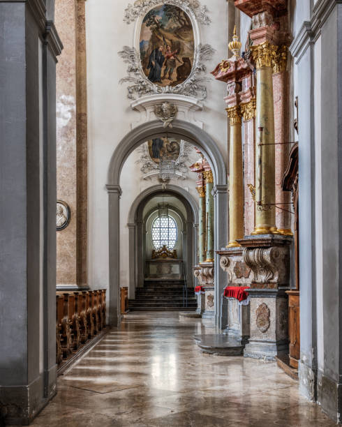 The exquisite and magnificent interior of the St, Mang Abbey in Füssen The monastery and the former Basilica of St. Mang date back to St. Magnus, an Irish missionary from the monastery of St. Gallen who worked in the Allgäu in the 8th century. Above his cell was the first church, which was extended and built over in the course of the centuries. The church was extended to its present size between the 11th and 14th centuries. The tower dates from 1200 and was ravaged and looted in the Thirty Years’ War, St. Mang was rebuilt in the Italian Baroque style by Johann Jakob Herkomer at the beginning of the 18th century. A light-flooded room, frescoes and marble characterize this style. The text was writen by myself st mang stock pictures, royalty-free photos & images