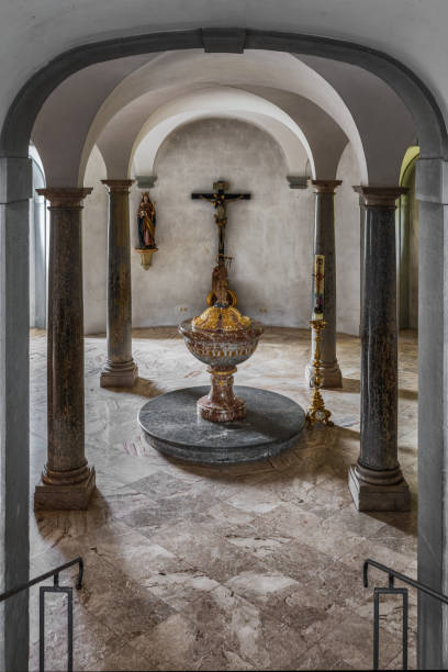 The exquisite and magnificent interior of the St, Mang Abbey in Füssen The monastery and the former Basilica of St. Mang date back to St. Magnus, an Irish missionary from the monastery of St. Gallen who worked in the Allgäu in the 8th century. Above his cell was the first church, which was extended and built over in the course of the centuries. The church was extended to its present size between the 11th and 14th centuries. The tower dates from 1200 and was ravaged and looted in the Thirty Years’ War, St. Mang was rebuilt in the Italian Baroque style by Johann Jakob Herkomer at the beginning of the 18th century. A light-flooded room, frescoes and marble characterize this style. The text was writen by myself st mang stock pictures, royalty-free photos & images