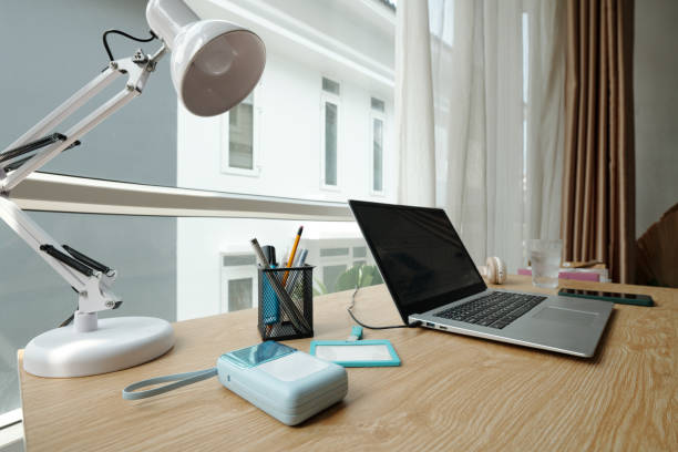 istock Modern Workspace with Laptop and Desk Lamp 2181907938