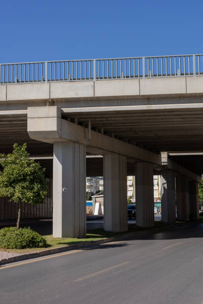 istock Urban infrastructure features an elevated road structure on a clear day in a busy city 2181912121