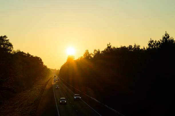 Autumn sunset over the highway A28 at the Veluwe in Gelderland, The Netherlands