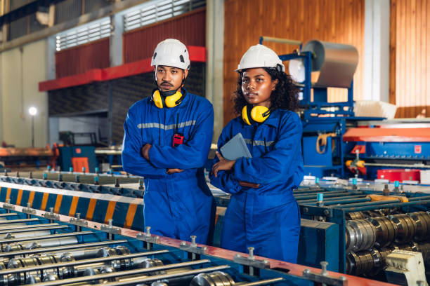 istock Foreman or worker work at factory site check up machine or products in site. 2181922029