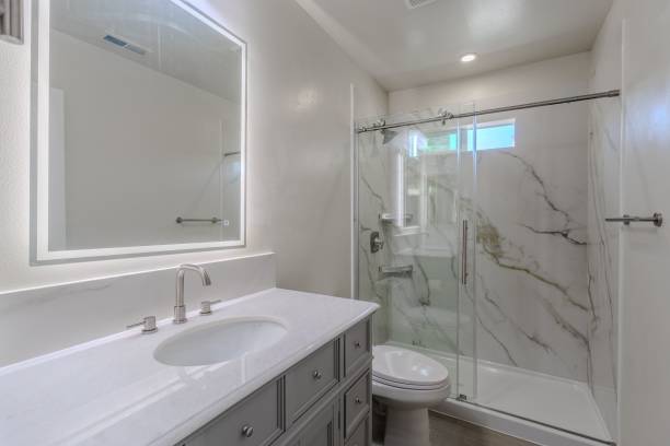 istock Modern bathroom with marble shower and vanity. 2181922086