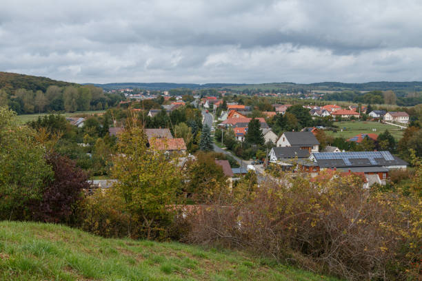 istock small village with red rooftops in lush landscape 2181923877