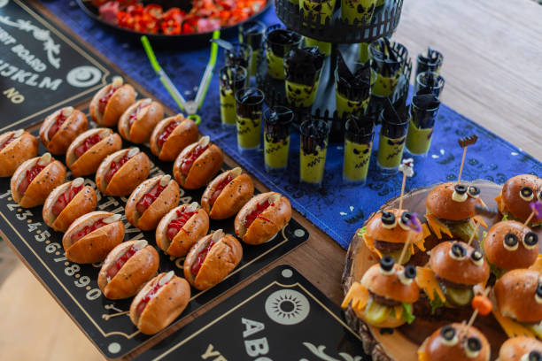 istock Halloween-themed catering served on a table at a costume party 2181927212